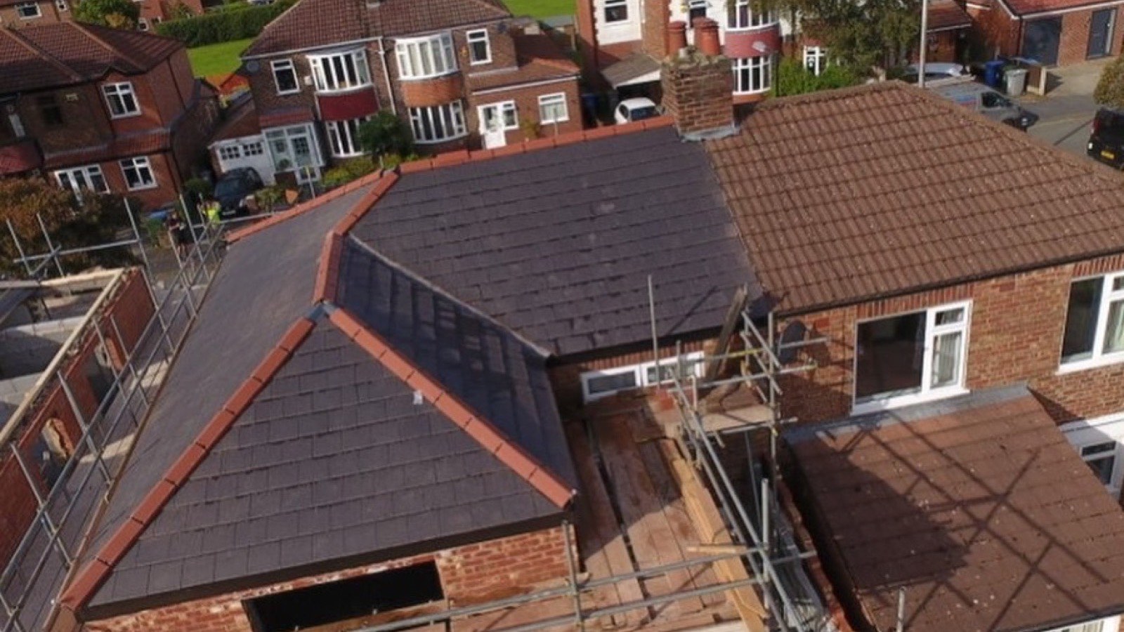 A newly tiled roof on a house